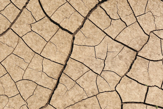 cracked dry ground representing severe dryness and lack of moisture