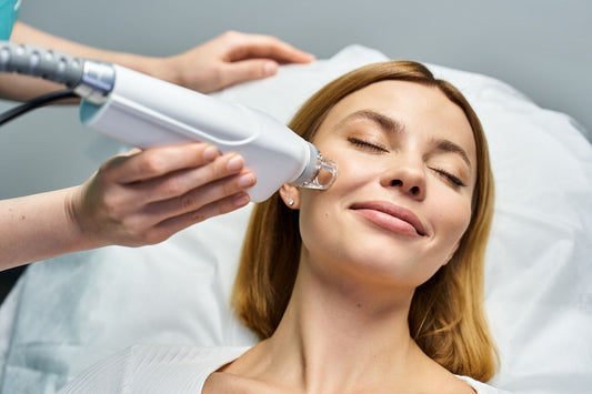 woman receiving a professional laser facial treatment