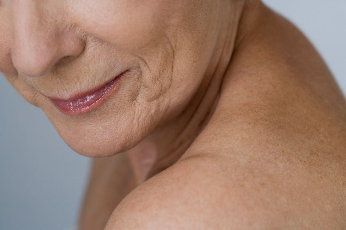 close up of mature skin showing visible texture, fine lines and signs of aging
