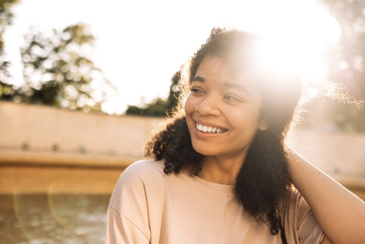 woman in the sun after applying skincare