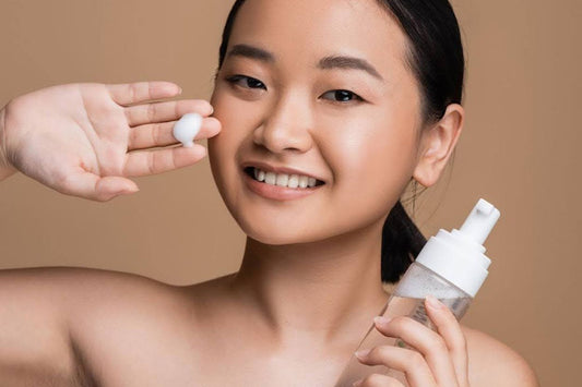 woman showing texture of a foaming cleanser